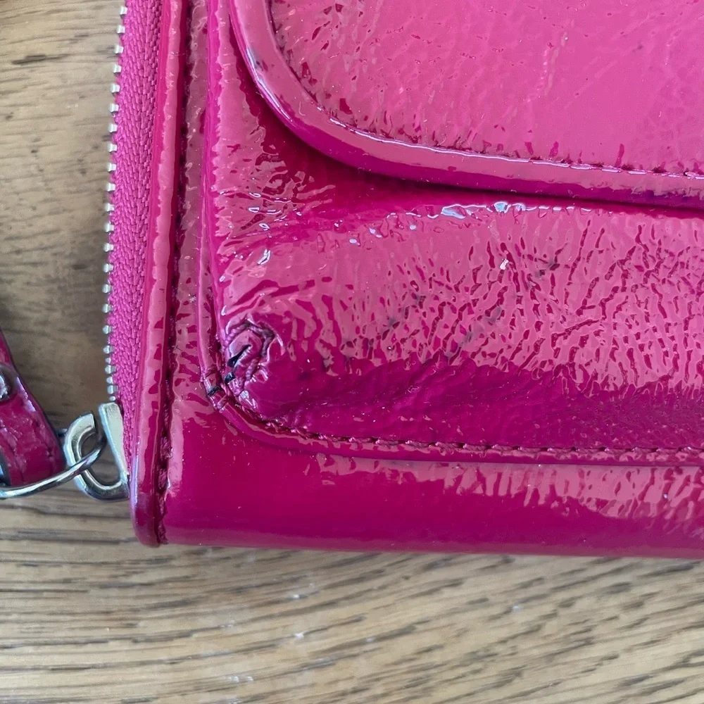 COACH Pink Zip Around Patent Leather Wristlet Wallet